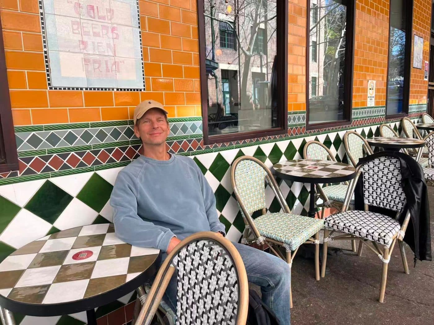 Mark at a café terrace